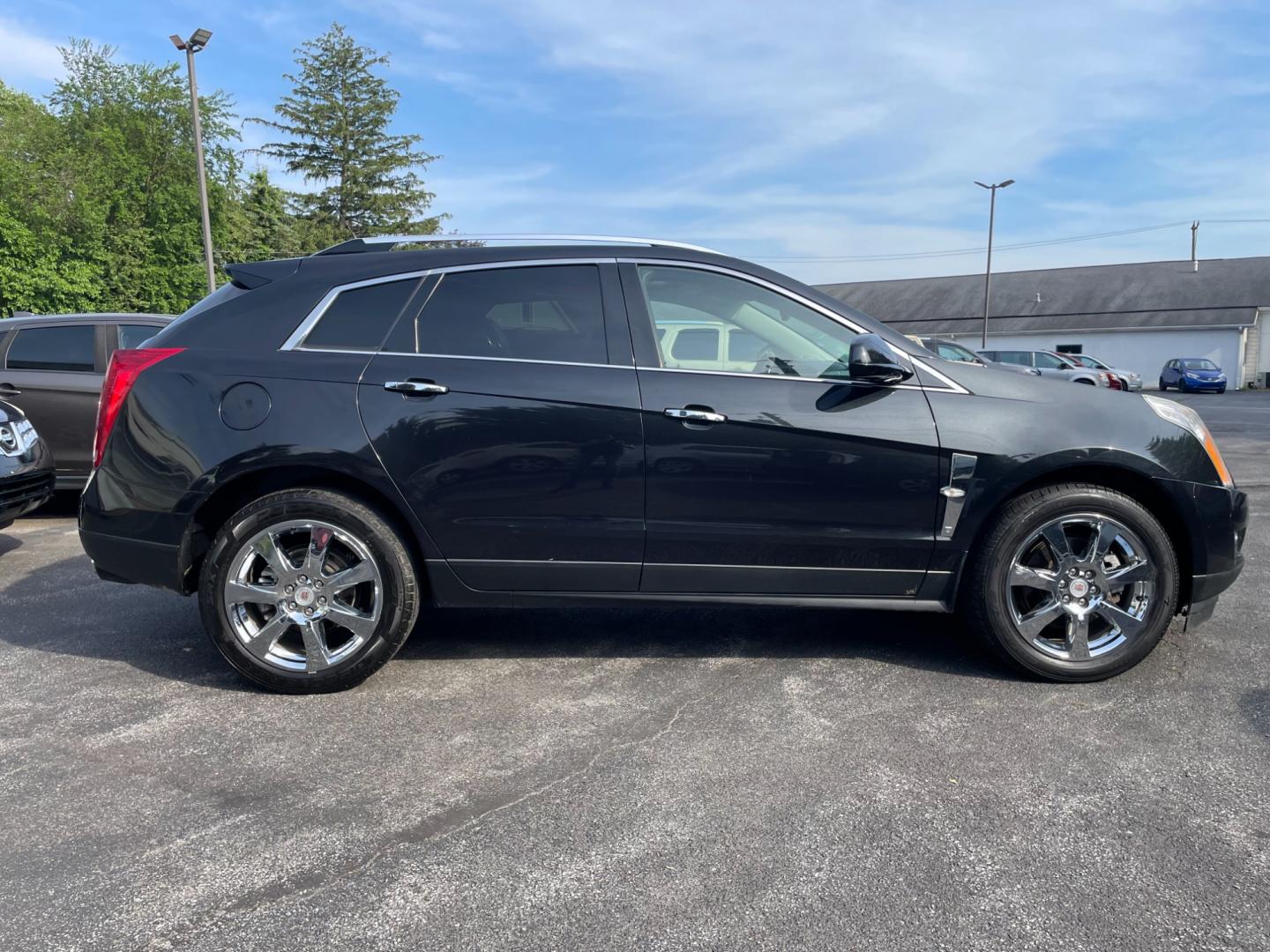 2012 black Cadillac SRX Premium (3GYFNCE33CS) with an 3.6L V6 DOHC 24V FFV engine, 6-Speed Automatic transmission, located at 101 N. Main Street, Muncy, PA, 17756, (570) 546-5462, 41.207691, -76.785942 - Photo#4